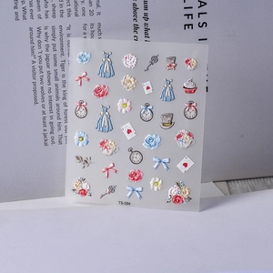 Detail of 5D embossed nail stickers featuring vintage pocket watch and rose patterns