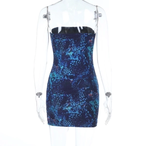Detail of a slim-fit strapless mini dress featuring a blue abstract leopard print pattern