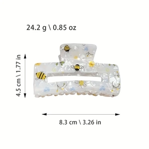 Dettaglio molletta per capelli a rettangolo con api, misure 8,3cm x 4,5cm e peso