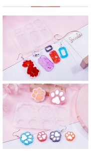 DIY silicone molds for geometric earrings showing star, moon, and cat paw resin designs