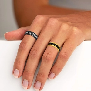 Men's titanium steel spinner ring with inner Cuban chain detail in black and gold