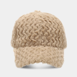 Detailed view of a beige fuzzy baseball cap featuring a unique wave texture pattern.