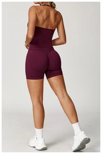 Detail view of seamless high-waist yoga shorts with scrunch butt lift in deep burgundy