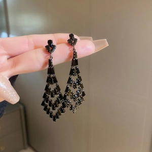 Elegant long black tassel drop earrings with geometric zircons in dark metal plating