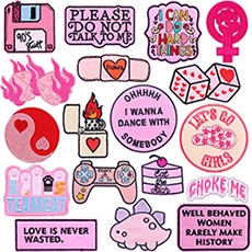 Detailed flat lay of pink Tarot embroidery patches featuring retro gamepad and icons