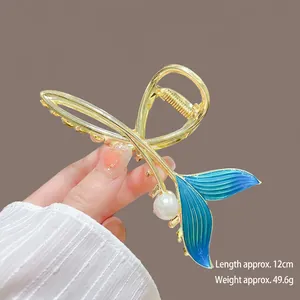 Detail of mermaid tail hair claw clip showing 12cm length and 49.6g weight specs