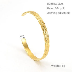 Detail of 6mm woven texture gold cuff bracelet in 18K gold plated stainless steel