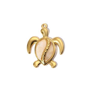 Detailed close-up of a golden turtle pendant with white mother of pearl inlay and top ring