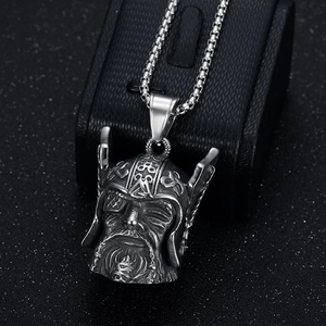 Silver Viking warrior helmet pendant necklace on a black textured jewelry gift box