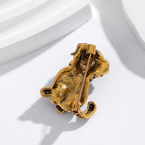 Vintage bulldog brooch in antique gold finish showing back pin closure details