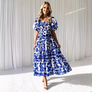 Elegant blue and white floral off-shoulder midi dress with puff sleeves and tiered skirt