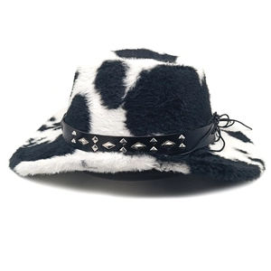 Detail of cow print faux fur cowboy hat with studded black leather band decoration