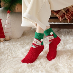 Cozy Christmas coral fleece socks with 3D Santa Claus pattern and white pom-poms