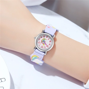Detailed shot of kids unicorn watch with 3D rainbow strap and purple silicone band