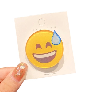 Fermaglio per capelli con emoji buffa e finitura lucida su scheda di carta