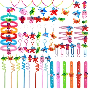 Ocean animal party favor set with colorful PVC keychains, bracelets, and rings