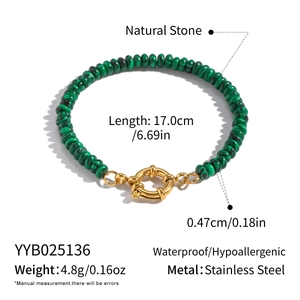 Detail of green malachite beaded bracelet with 17cm length and gold stainless steel clasp