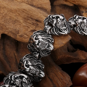 Detailed view of heavy stainless steel men's bracelet with wild lion head links