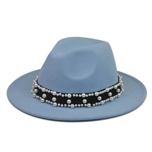 Close-up of light blue wool fedora hat with black band and faux pearl embellishments