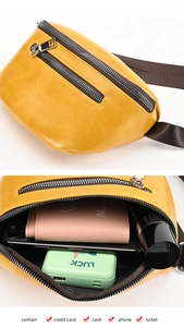 Detail view of the yellow PU leather crossbody bag showing inner storage capacity