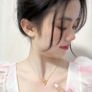 Elegant gold double interlocking heart necklace for women in durable titanium steel