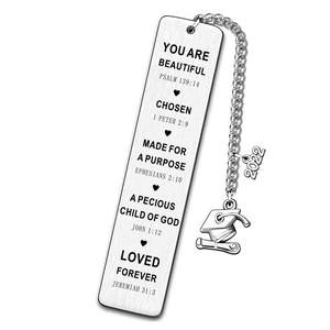 Detailed macro of stainless steel bookmark with bible verses and 2022 graduation charms
