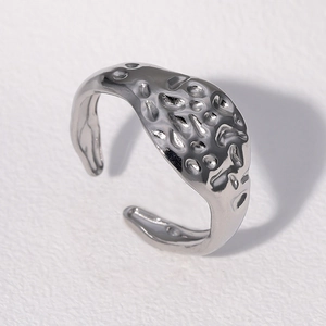 Minimalist silver hammered stainless steel open ring with irregular liquid metal texture