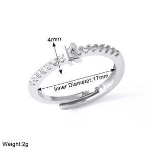 Detailed shot of silver letter K ring with diamonds showing 4mm height and 17mm diameter
