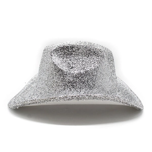 Close-up detail of shiny silver sequins on a Western cowboy hat for party events