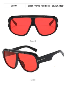 Macro shot of oversized aviator sunglasses with silver T-bar detail and red lenses