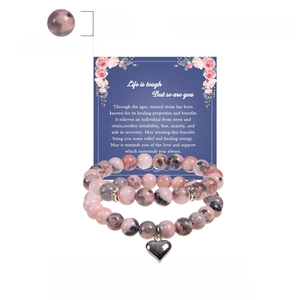 Pink zebra stone bead bracelet set with heart pendant and healing card display