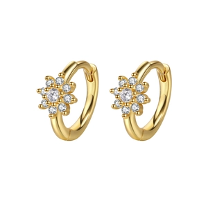 Gold flower huggie earrings with purple zircon star pendants and shimmering diamonds