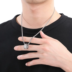 Silver stainless steel chain necklace for men with a cylindrical ring pendant accessory