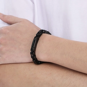 Close-up of black Byzantine chain bracelet in stainless steel on a male wrist