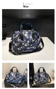 Detail of blue skull and rose pattern on large capacity travel gym bag with shoulder strap