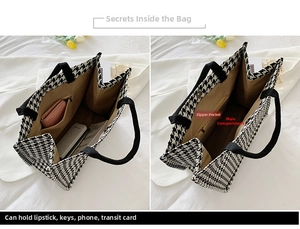 Detail view of houndstooth tote interior showing large capacity and zipper pocket