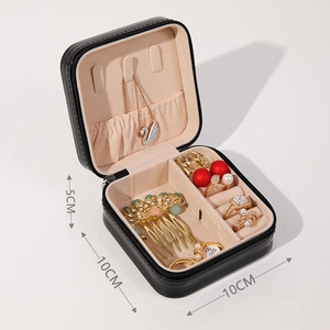 Portable black jewelry box with interior compartments and 10x10x5cm size markings