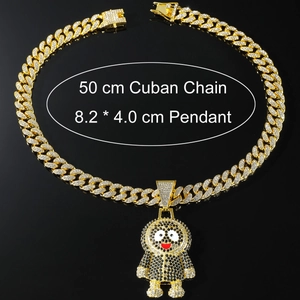 Detail view of a iced-out cartoon pendant with 50 cm golden Cuban chain dimensions