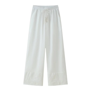 White linen-blend wide leg trousers with high elastic waist and floral embroidery