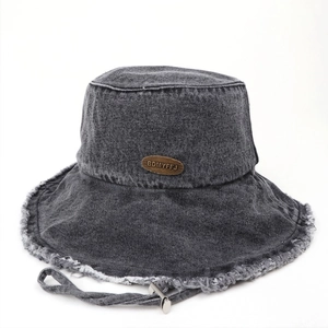 Vintage washed gray denim bucket hat with frayed edges and adjustable chin strap