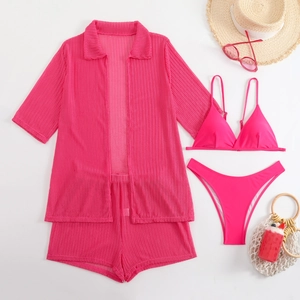 Detail of rose red 4-piece beach set with mesh shirt and matching swimwear essentials