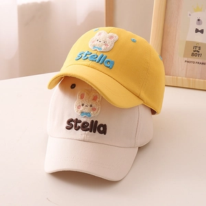 Cute kids baseball cap with bunny embroidery and stella lettering in yellow and beige