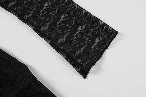 Gros plan de dentelle florale noire élégante avec des motifs découpés complexes pour robes