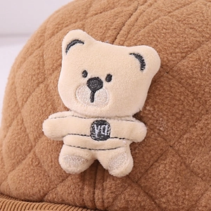 Quilted brown plush baby baseball cap with cute beige bear patch and corduroy brim