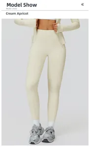 Detail view of high-waist thermal yoga leggings and zip jacket in creamy apricot color