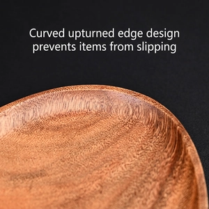 Walnut wood tray for keys and jewelry with curved edges to prevent items from sliding