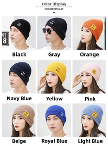 Multi-color grid display of sequined knit beanies with Moment of Ambitions woven patch
