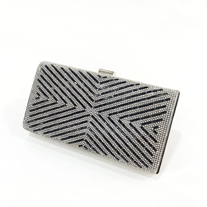 Elegant geometric X-stripe evening clutch with sparkling silver and black rhinestones