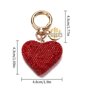 Detailed dimensions of a red rhinestone heart keychain with golden metal ring and tag