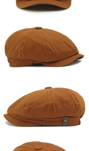 Detail of vintage brown newsboy cap showing cotton twill fabric and metal rivets